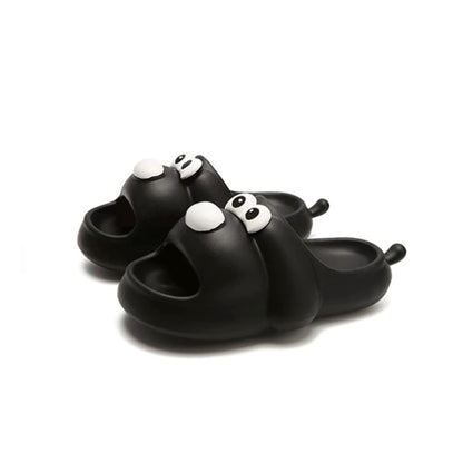 Cute black cartoon dog EVA slide sandals with big white eyes and small tail, lightweight all-EVA indoor shoes