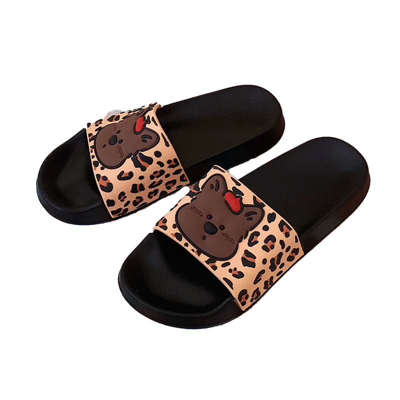 Cute black leopard print dog slippers with brown dog face and red tongue, PVC upper and EVA sole, slip-on indoor shoes