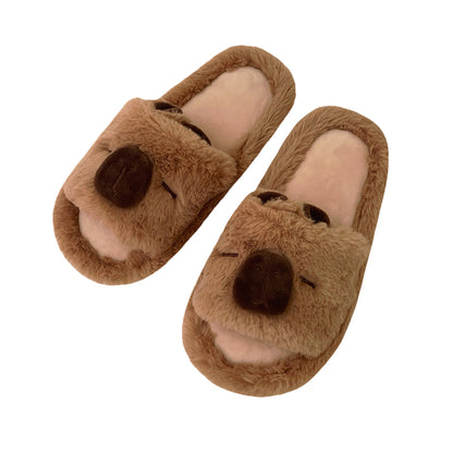 Cute brown capybara plush slide slippers with closed eyes, big dark nose, and fluffy faux fur, indoor shoes with PVC sole