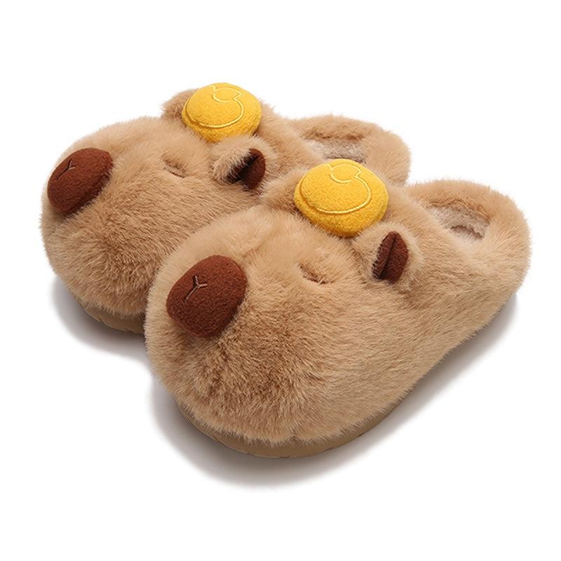 Cute brown capybara plush slippers with gold ingot on head and closed eyes, fuzzy indoor shoes with TPR sole