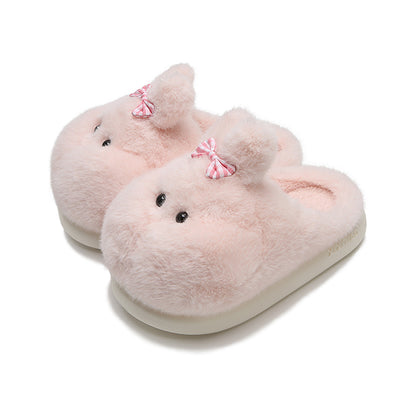 Cute pink bunny plush slippers with bow on ear and black dot eyes, closed-back fuzzy indoor shoes with EVA sole