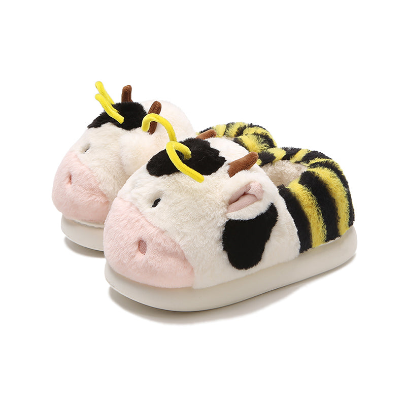 Cute pink cow and bee plush slippers with black patches, yellow stripes, and yellow antennae, closed-back fuzzy indoor shoes with EVA sole