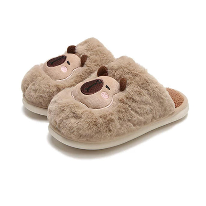 Fluffy khaki plush slippers decorated with a capybara face motif and stitched dark brown nose, soft indoor slip-on footwear with PVC sole