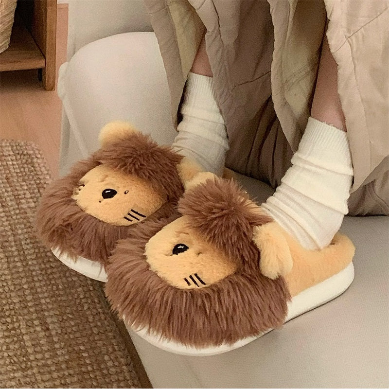 Yellow plush lion slippers featuring a thick brown furry mane and a stitched smile, cozy home shoes with EVA sole