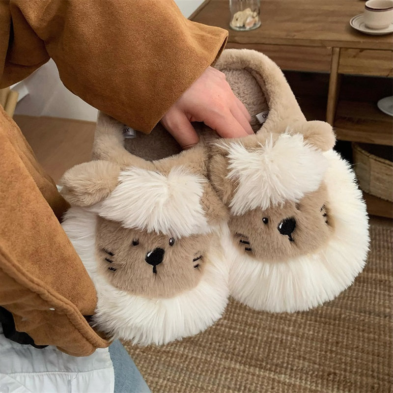 Khaki plush slippers shaped like a lion with a shaggy brown mane and three cheek whiskers, soft indoor footwear with EVA sole
