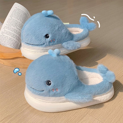 Light blue open-toe plush slippers shaped like a 3D whale with a top water spout and glossy eyes, soft indoor footwear with EVA sole
