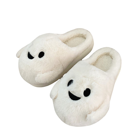 Playful white Halloween ghost face plush slippers featuring black dot eyes and a wavy smile, soft indoor footwear with EVA sole