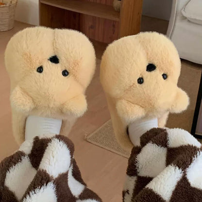 Yellow chubby bear plush slippers featuring a rounded silhouette, small ears, and black dot eyes, soft indoor footwear with PVC sole