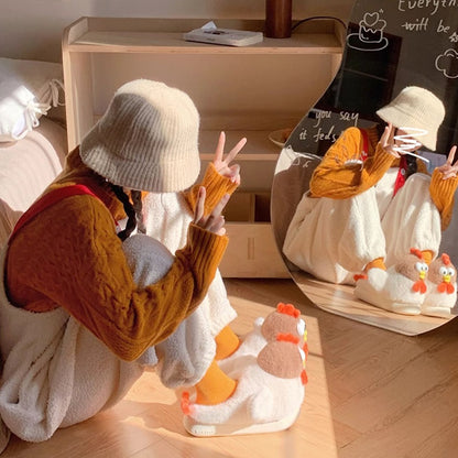 White cartoon chicken design plush slippers featuring large eyes and a vibrant orange comb, soft indoor footwear with EVA sole