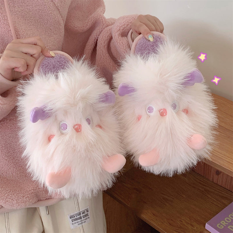 Extra fluffy pink sprite character plush slippers featuring purple ears and soft cheek patches, cozy indoor footwear with PVC sole