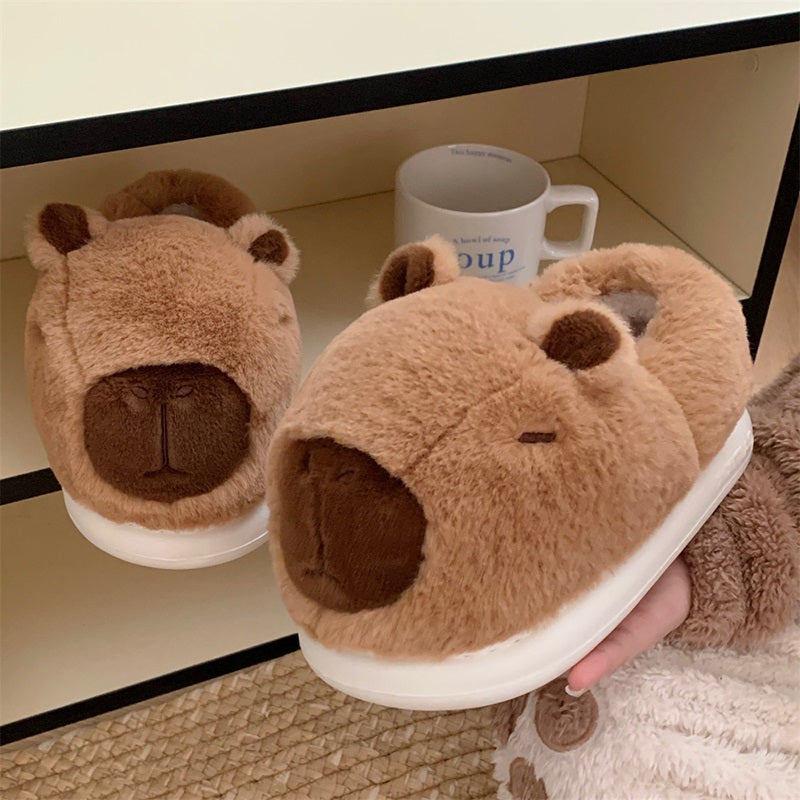 Cute brown capybara plush slippers with large rounded snout and small ears, closed-back fuzzy indoor shoes with EVA sole