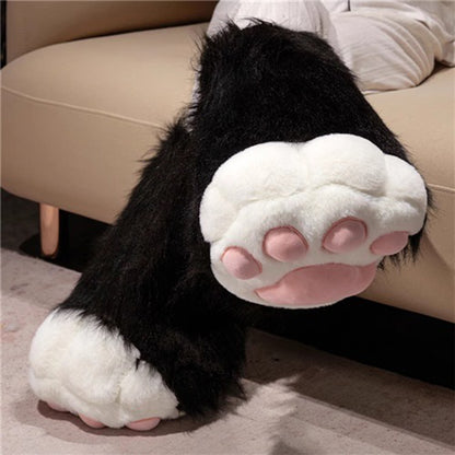 Black and white faux fur cat paw cosplay boots featuring four pink toe beans and a large main pad, 13.78-inch suede sole footwear