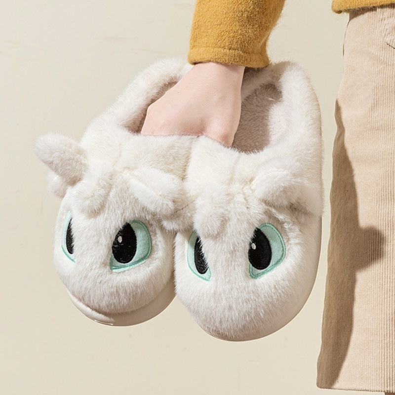 White fluffy dragon plush slippers featuring large mint-outlined eyes and small horn details, PVC sole indoor footwear