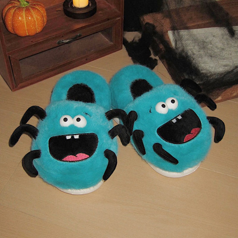 Teal blue plush spider monster slippers with black legs and a big mouth, indoor footwear with EVA sole