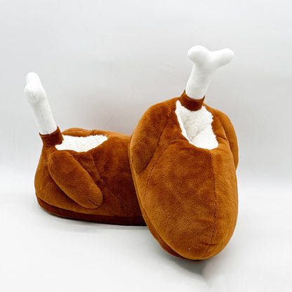 Brown turkey leg shaped indoor slippers with a white fabric bone accent and plush hanging wings, lightweight non-waterproof fabric sole holiday footwear