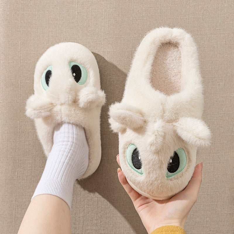 White fluffy dragon plush slippers featuring large mint-outlined eyes and small horn details, PVC sole indoor footwear