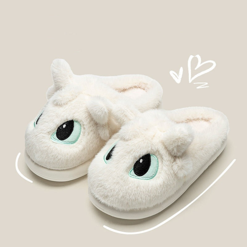 White fluffy dragon plush slippers featuring large mint-outlined eyes and small horn details, PVC sole indoor footwear