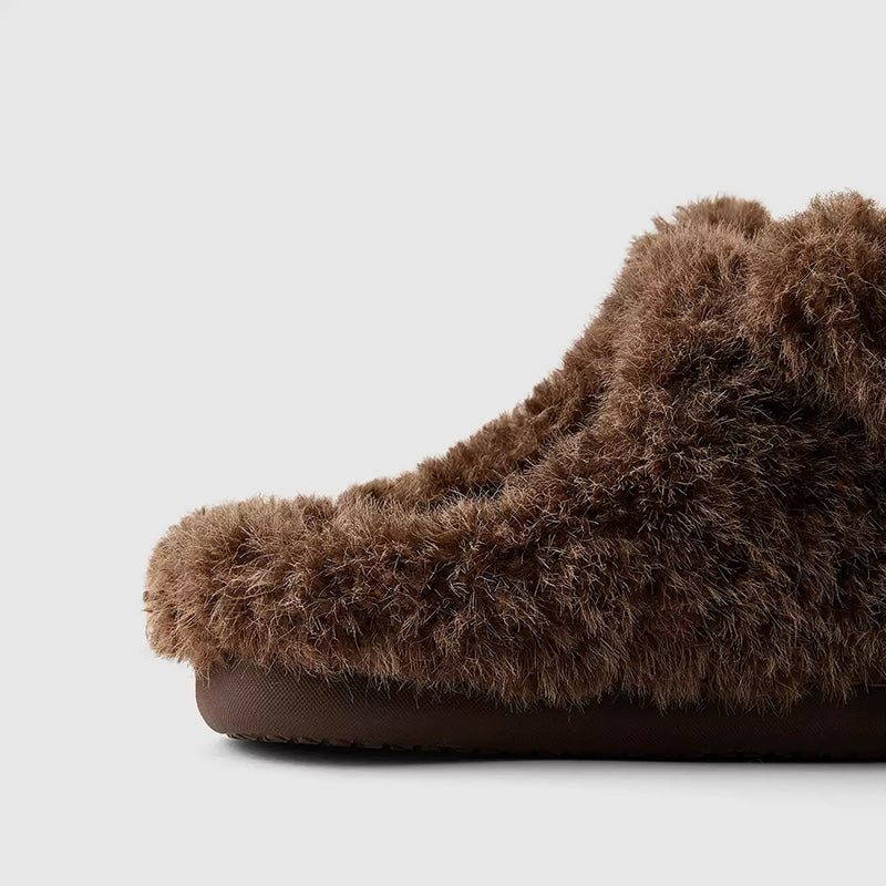 Dark brown shaggy bear plush slippers with a large white muzzle patch and a central fabric nose, cozy indoor footwear with TPR sole