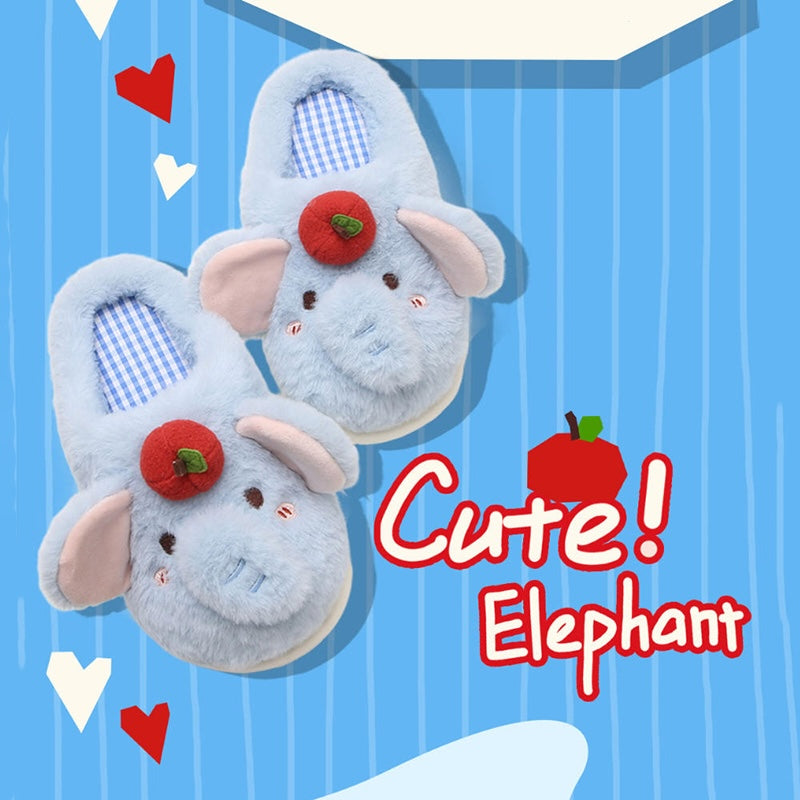 Blue plush elephant slippers with large pink ears and a red apple top decoration, cozy indoor footwear with EVA sole